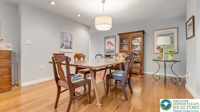 a balcony with furniture and wooden floor