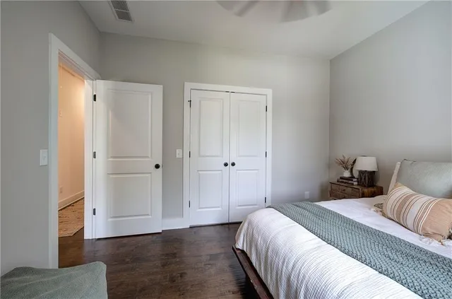 a bedroom with furniture and a dresser