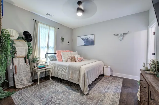 a view of kitchen with stainless steel appliances kitchen island a sink stove and refrigerator