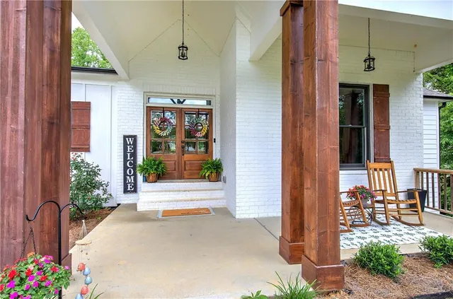 a front view of a house with a porch