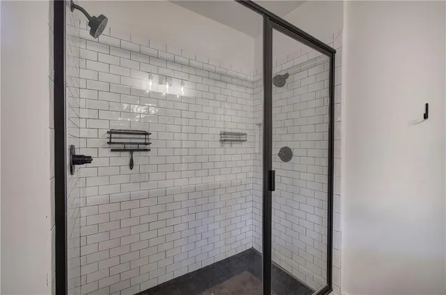 a view of a hall with wooden floor