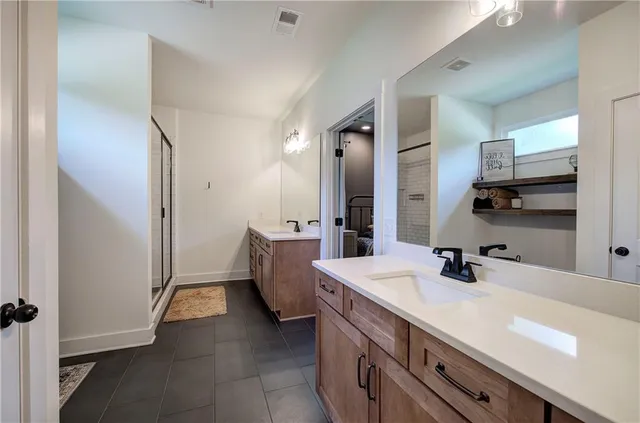 a view of a room with wooden walls