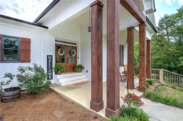 a front view of a house with a porch