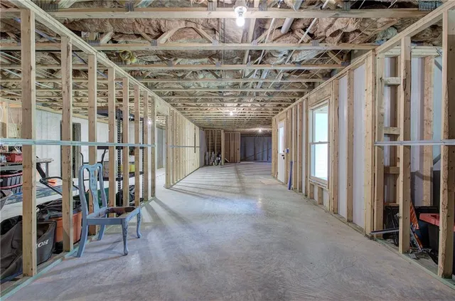 an aerial view of a house with outdoor space