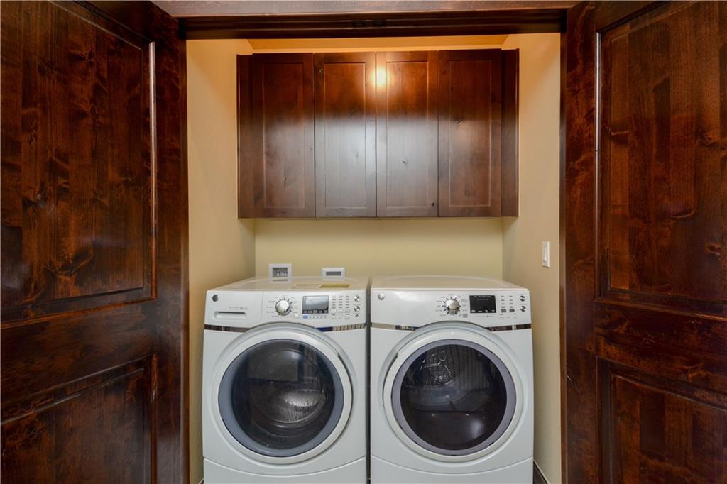 64 Erickson Loop, Unit 12B Keystone, CO 80435 - Photo 12 of 15 a utility room with dryer and washer