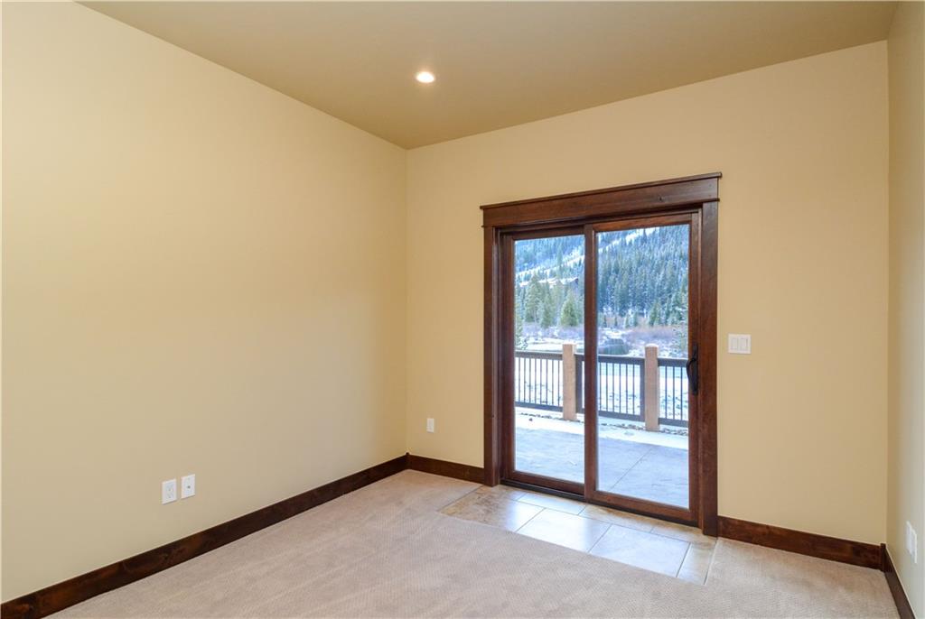 64 Erickson Loop, Unit 12B Keystone, CO 80435 - Photo 10 of 15 a view of an empty room with a window
