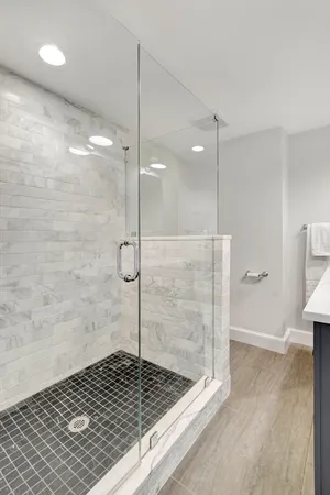 a bedroom with a bed and a view of bedroom