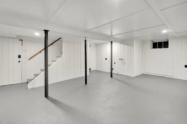 a view of a chair and table in the balcony