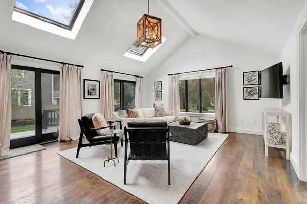 a view of entryway with wooden floor and stairs