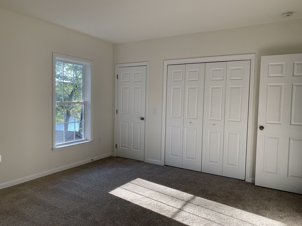 38 Stevens Park Road Charlton, MA 01507 - Photo 15 of 40 a view of an empty room and window