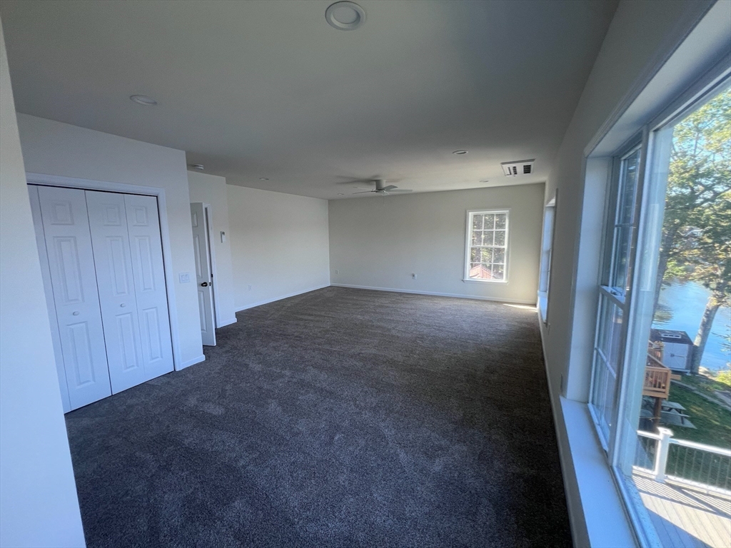 38 Stevens Park Road Charlton, MA 01507 - Photo 26 of 40 a view of an empty room and a window