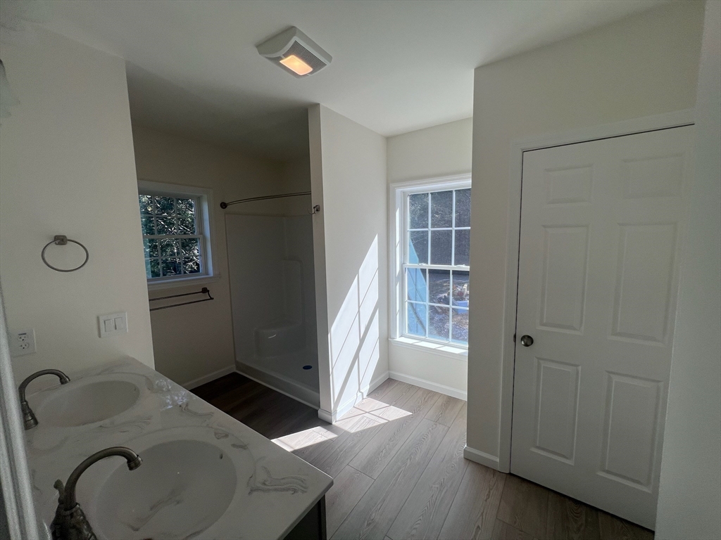 38 Stevens Park Road Charlton, MA 01507 - Photo 28 of 40 a bathroom with a sink and a shower