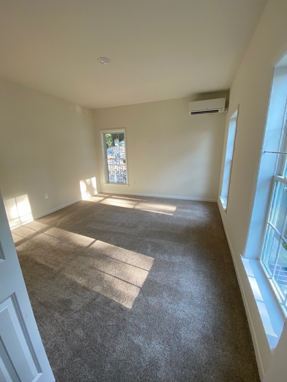 38 Stevens Park Road Charlton, MA 01507 - Photo 31 of 40 a view of a big room with stairs and a window