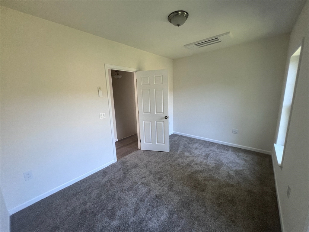 38 Stevens Park Road Charlton, MA 01507 - Photo 32 of 40 an empty room with an entryway