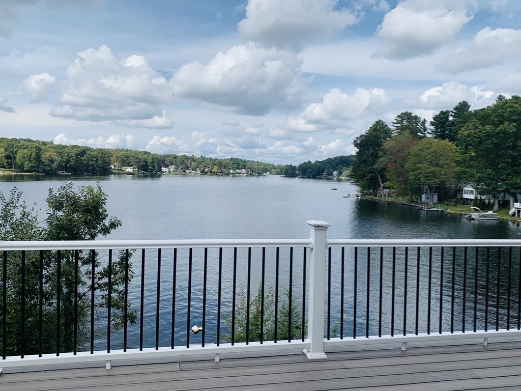 38 Stevens Park Road Charlton, MA 01507 - Photo 5 of 40 a balcony with wooden floor and lake view
