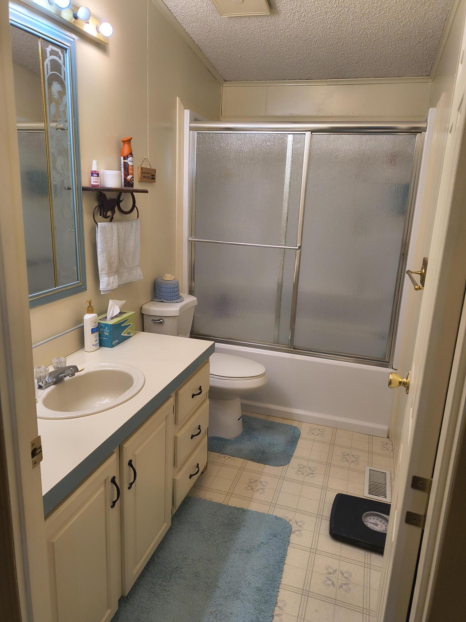 235 North Roosevelt Street Merrill, OR 97633 - Photo 19 of 27 a bathroom with a sink and a mirror