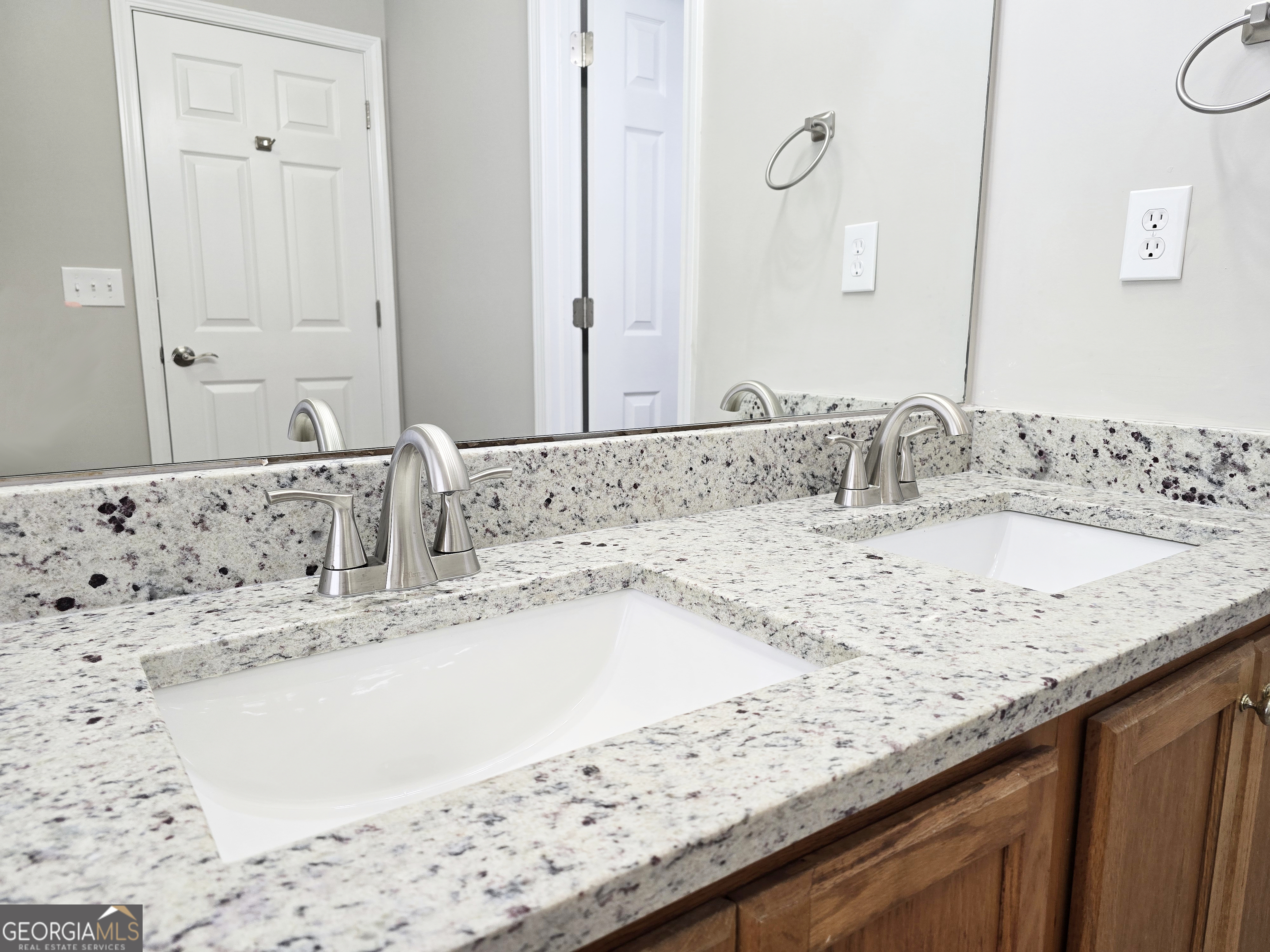 537 Goldfinch Way Stockbridge, GA 30281 - Photo 15 of 20 a bathroom with a granite countertop sink and a bathtub