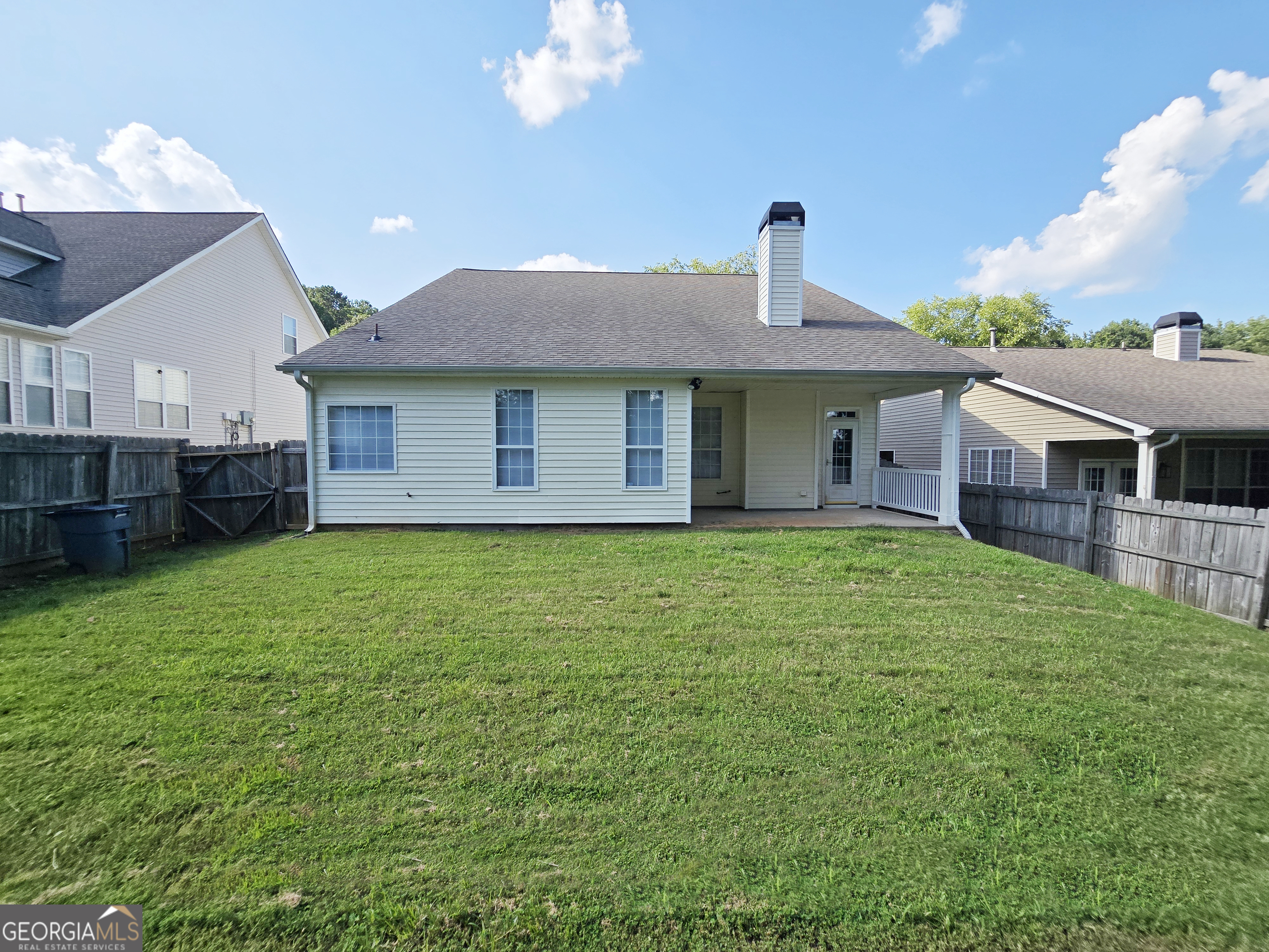 537 Goldfinch Way Stockbridge, GA 30281 - Photo 20 of 20 a front view of a house with a garden