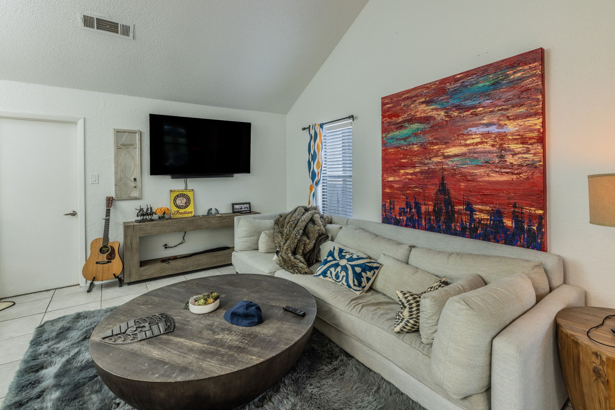 1008 Milford Way Austin, TX 78745 - Photo 22 of 40 Vaulted ceiling living space featuring tile flooring