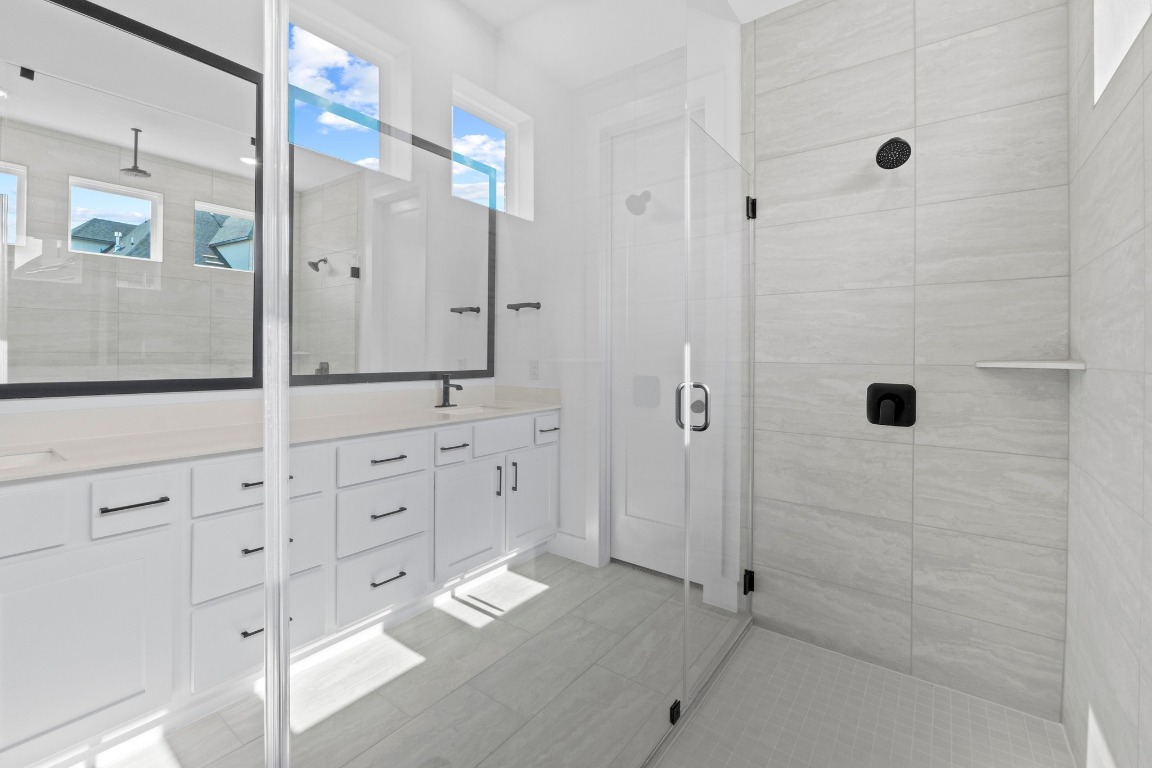 3209 Moon Ridge Road Georgetown, TX 78628 - Photo 15 of 28 a bathroom with a shower