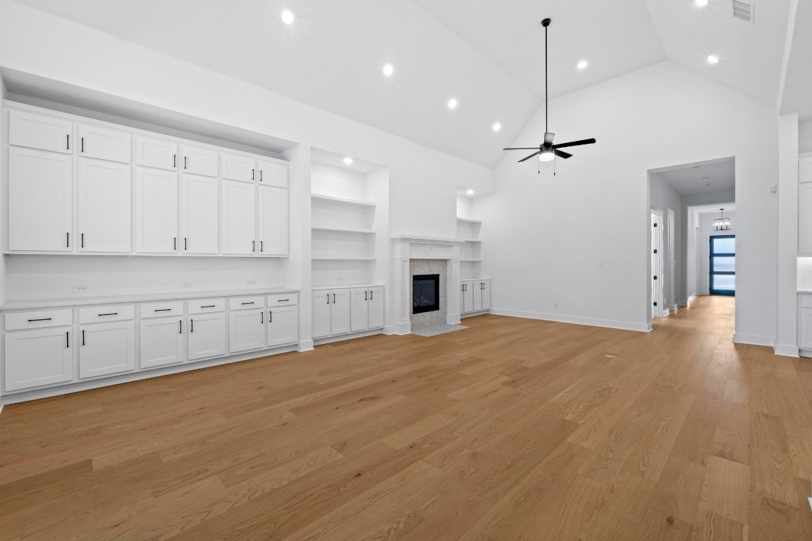 3209 Moon Ridge Road Georgetown, TX 78628 - Photo 20 of 28 a view of an empty room with cabinet and kitchen view
