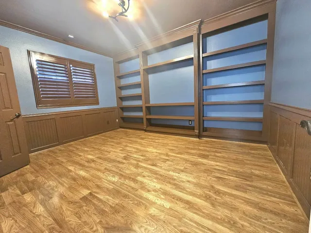 front view of a house with a garden