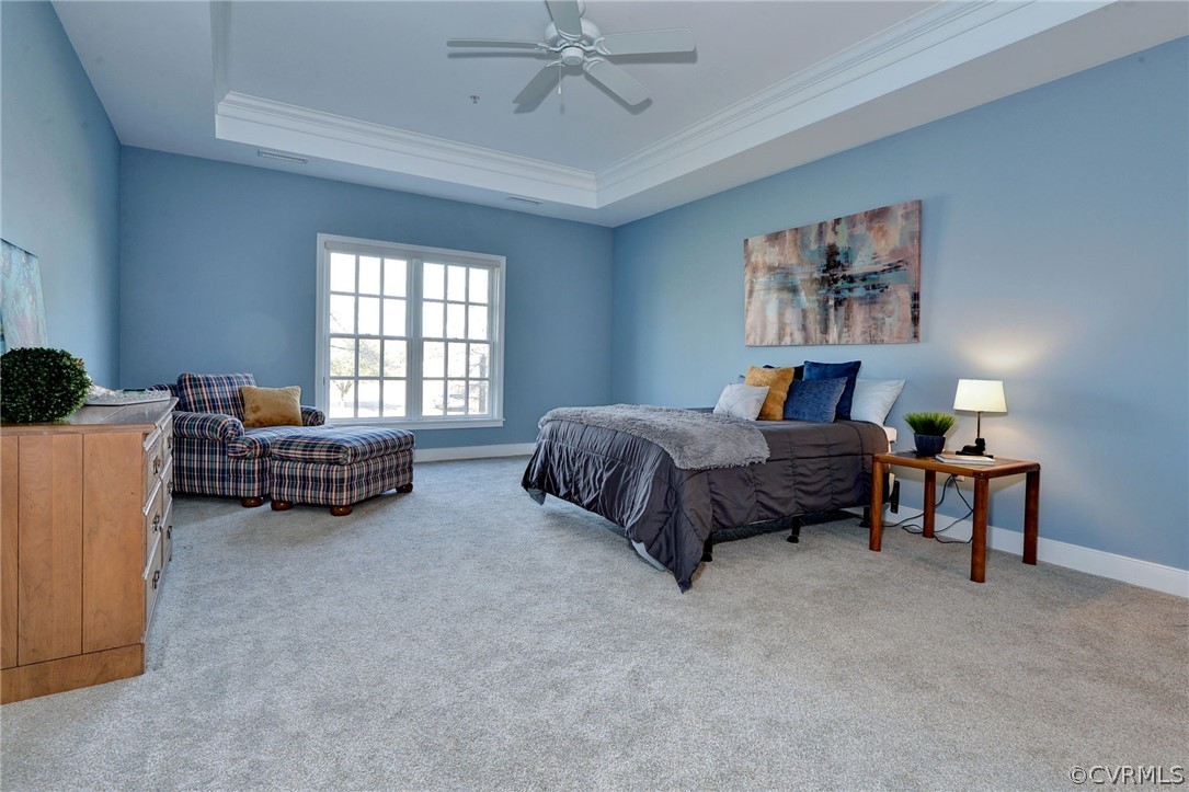 1103 Eaglescliffe Williamsburg, VA 23188 - Photo 19 of 50 a spacious bedroom with a bed a couch and a window