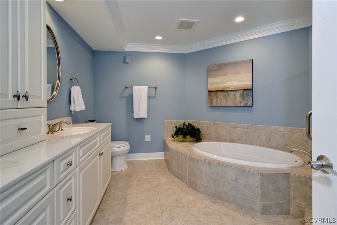 1103 Eaglescliffe Williamsburg, VA 23188 - Photo 23 of 50 a bathroom with a tub a sink and mirror