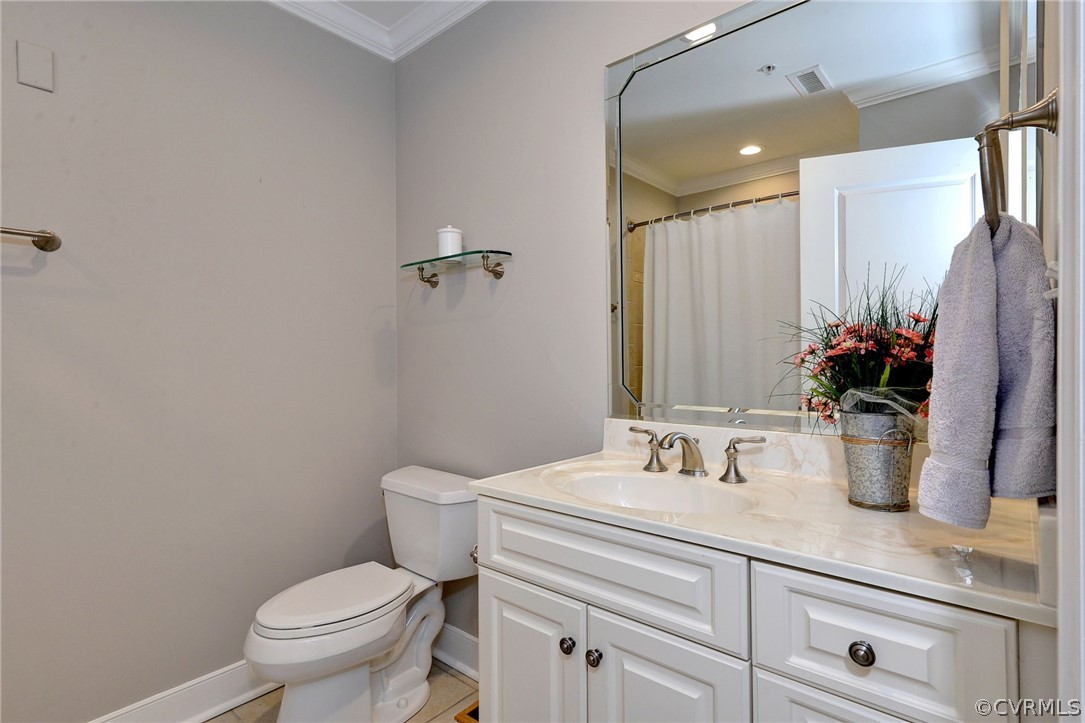 1103 Eaglescliffe Williamsburg, VA 23188 - Photo 27 of 50 a bathroom with a sink a toilet and mirror