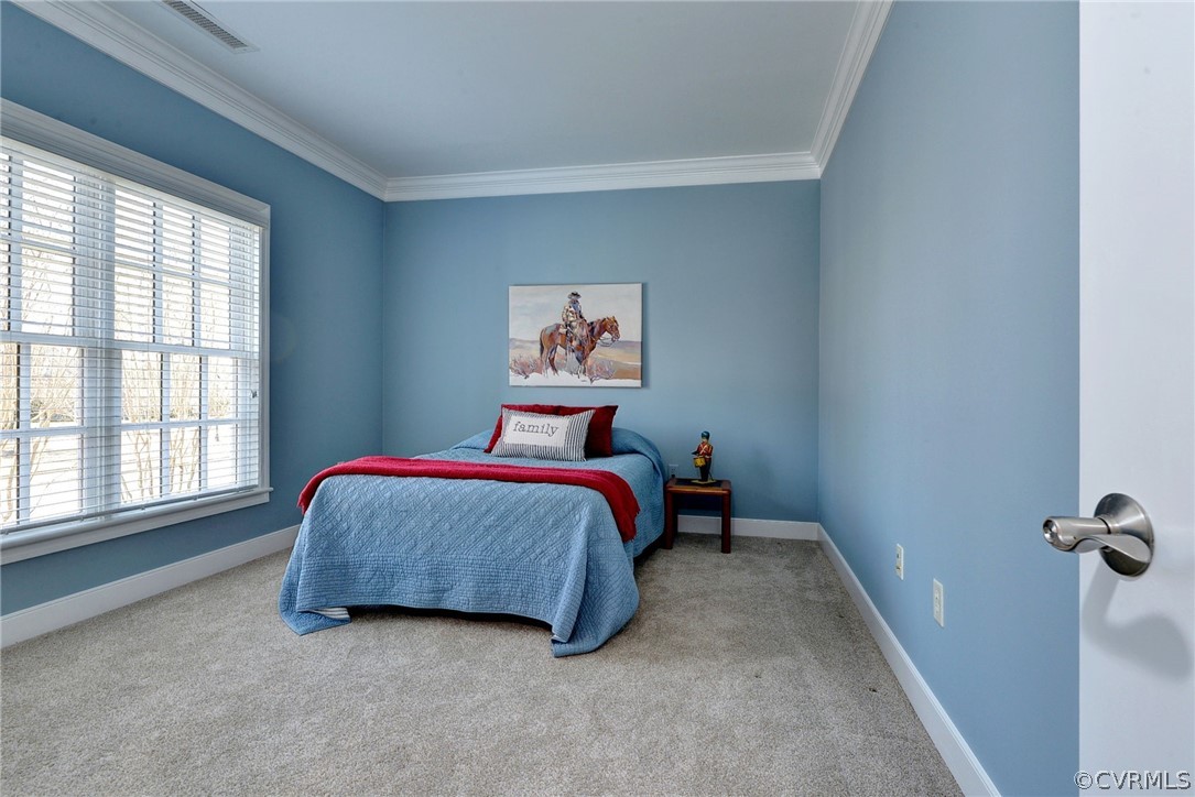 1103 Eaglescliffe Williamsburg, VA 23188 - Photo 28 of 50 a bedroom with a bed and a window