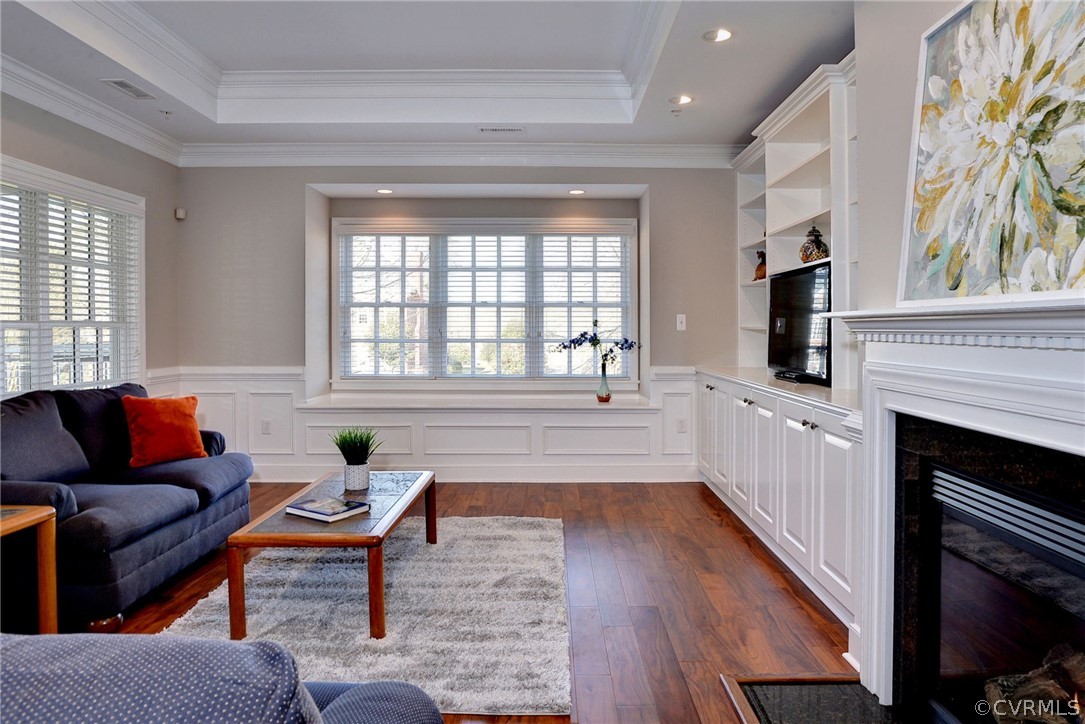 1103 Eaglescliffe Williamsburg, VA 23188 - Photo 3 of 50 a living room with furniture a fireplace and a large window