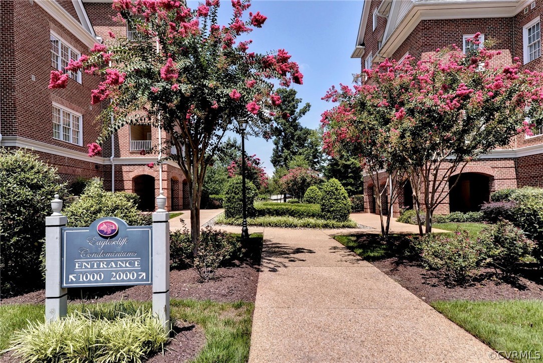 1103 Eaglescliffe Williamsburg, VA 23188 - Photo 38 of 50 a front view of a house with a yard and fountain