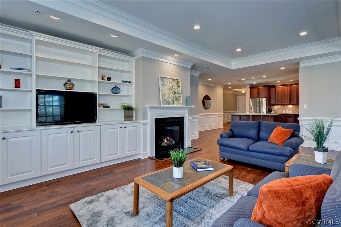 1103 Eaglescliffe Williamsburg, VA 23188 - Photo 4 of 50 a living room with furniture a flat screen tv and a fireplace