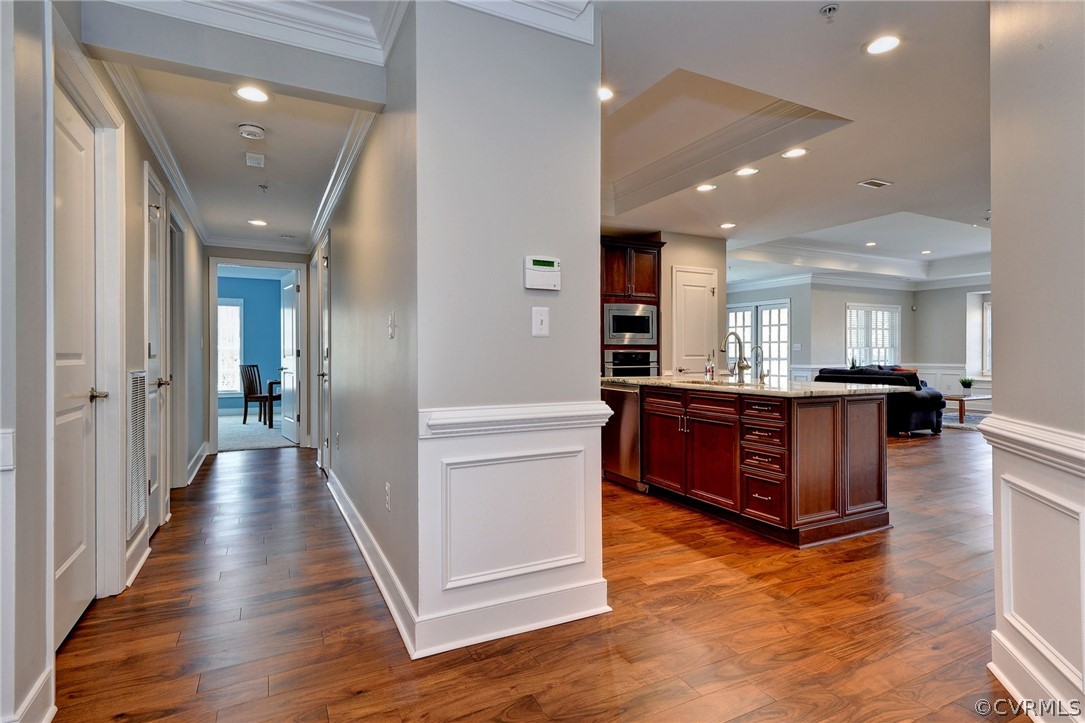 1103 Eaglescliffe Williamsburg, VA 23188 - Photo 8 of 50 a view of kitchen and hall with wooden floor