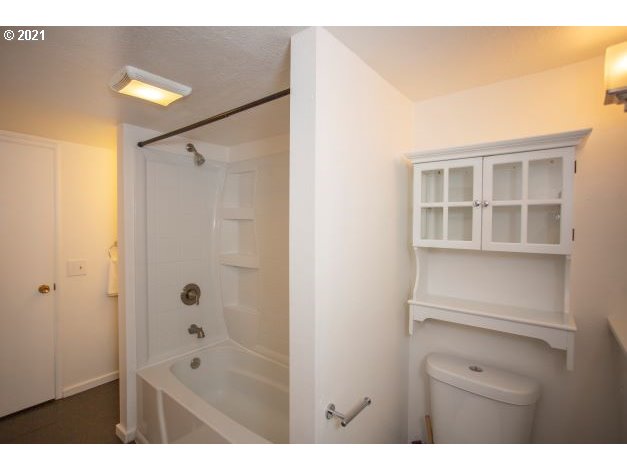 8325 Southwest Terwilliger Boulevard Portland, OR 97219 - Photo 16 of 30 a bathroom with a shower