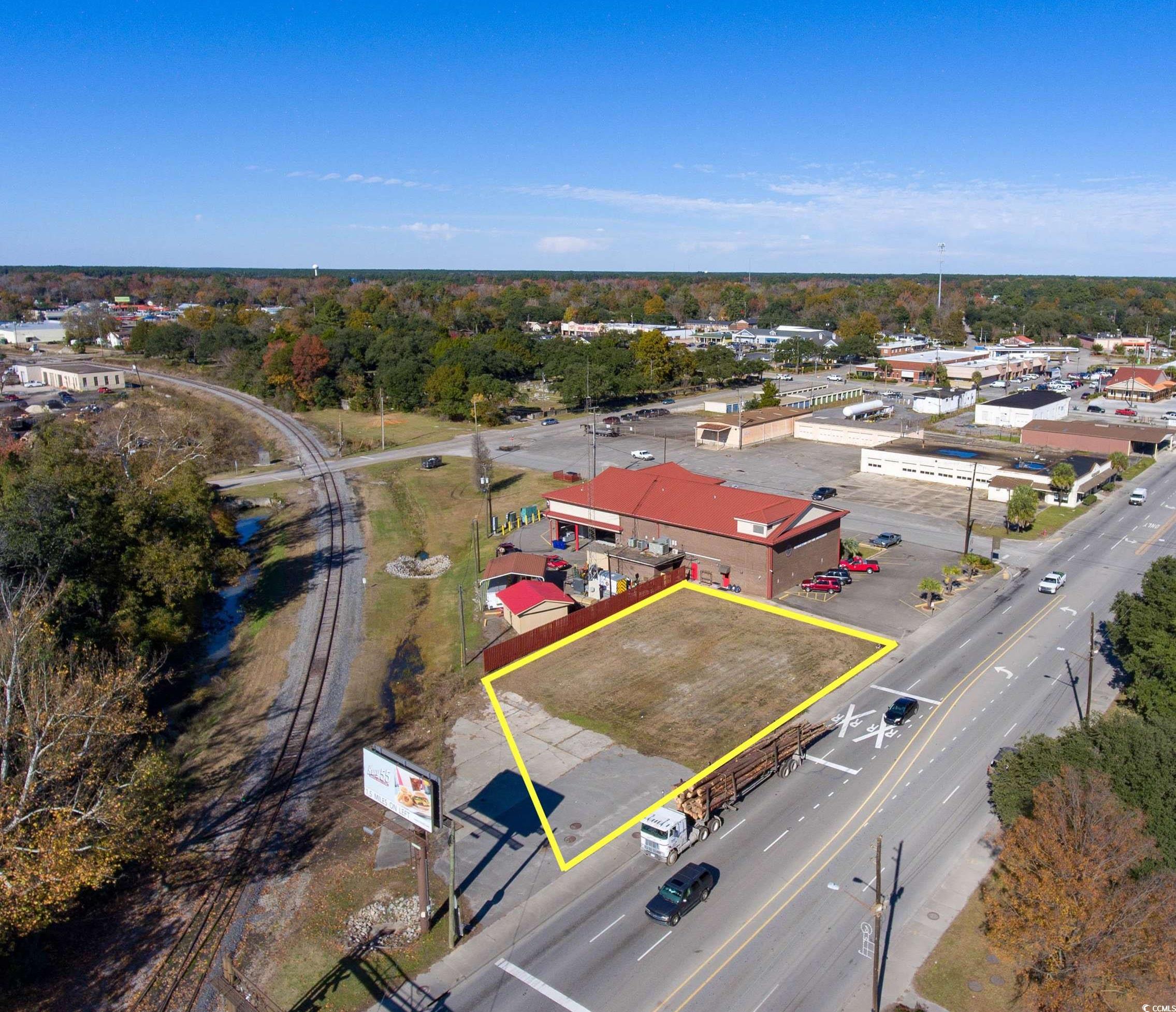 125 North Fraser Street Georgetown, SC 29440 - Photo 2 of 3 Aerial overview of property's location with property boundaries highlighted