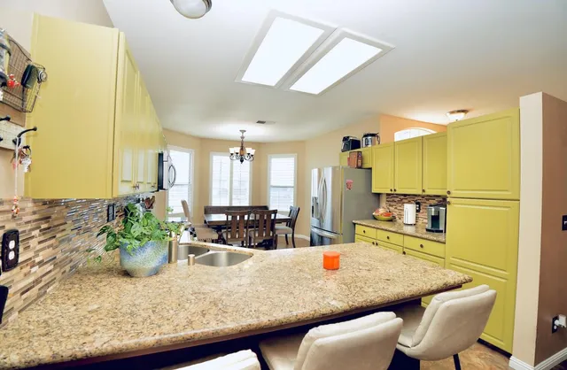 a view of a dining room with furniture