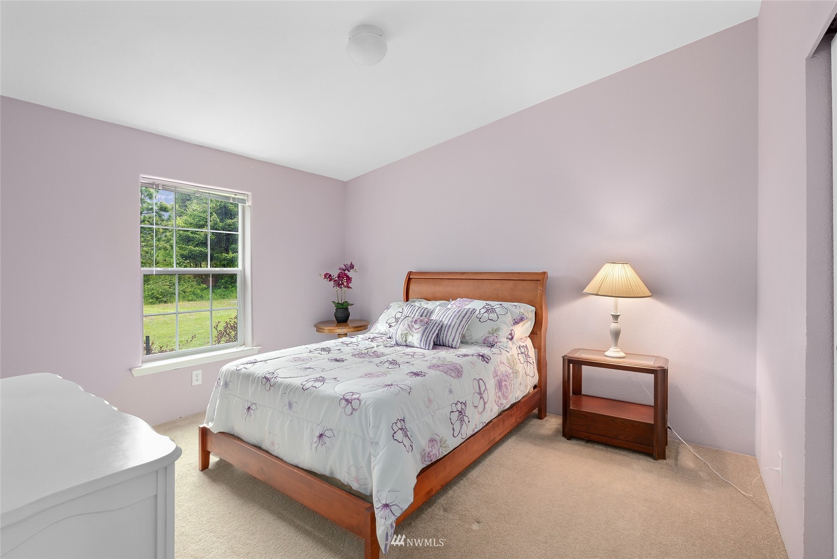 6746 Nelson Siding Road Cle Elum, WA 98922 - Photo 21 of 27 a bedroom with a bed and a window