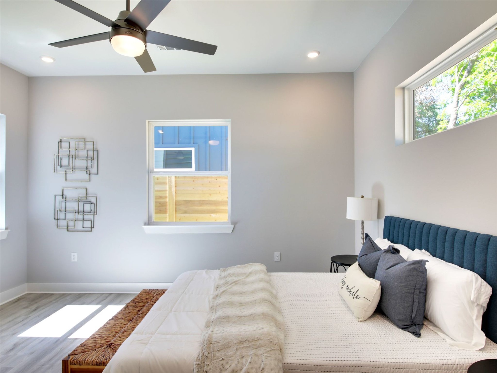 6111 Carnation Terrace, Unit 1 Austin, TX 78741 - Photo 14 of 23 a bedroom with a bed and a window