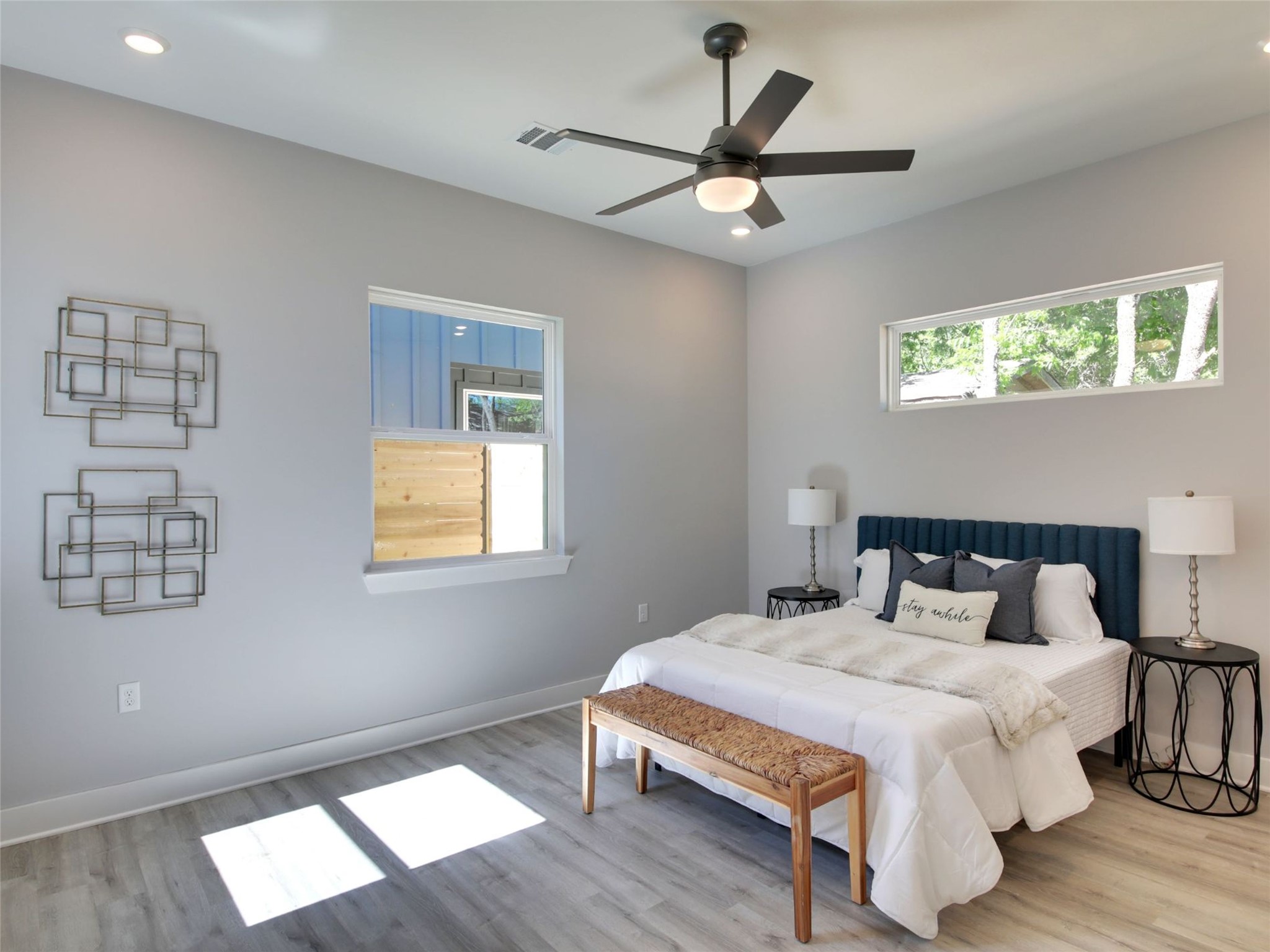 6111 Carnation Terrace, Unit 1 Austin, TX 78741 - Photo 18 of 23 a bedroom with a bed and a window