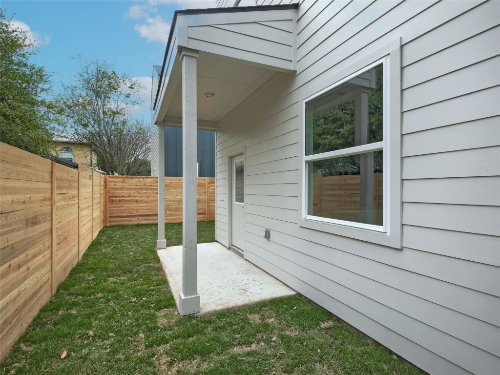 6111 Carnation Terrace, Unit 1 Austin, TX 78741 - Photo 21 of 23 a view of backyard with small cabin