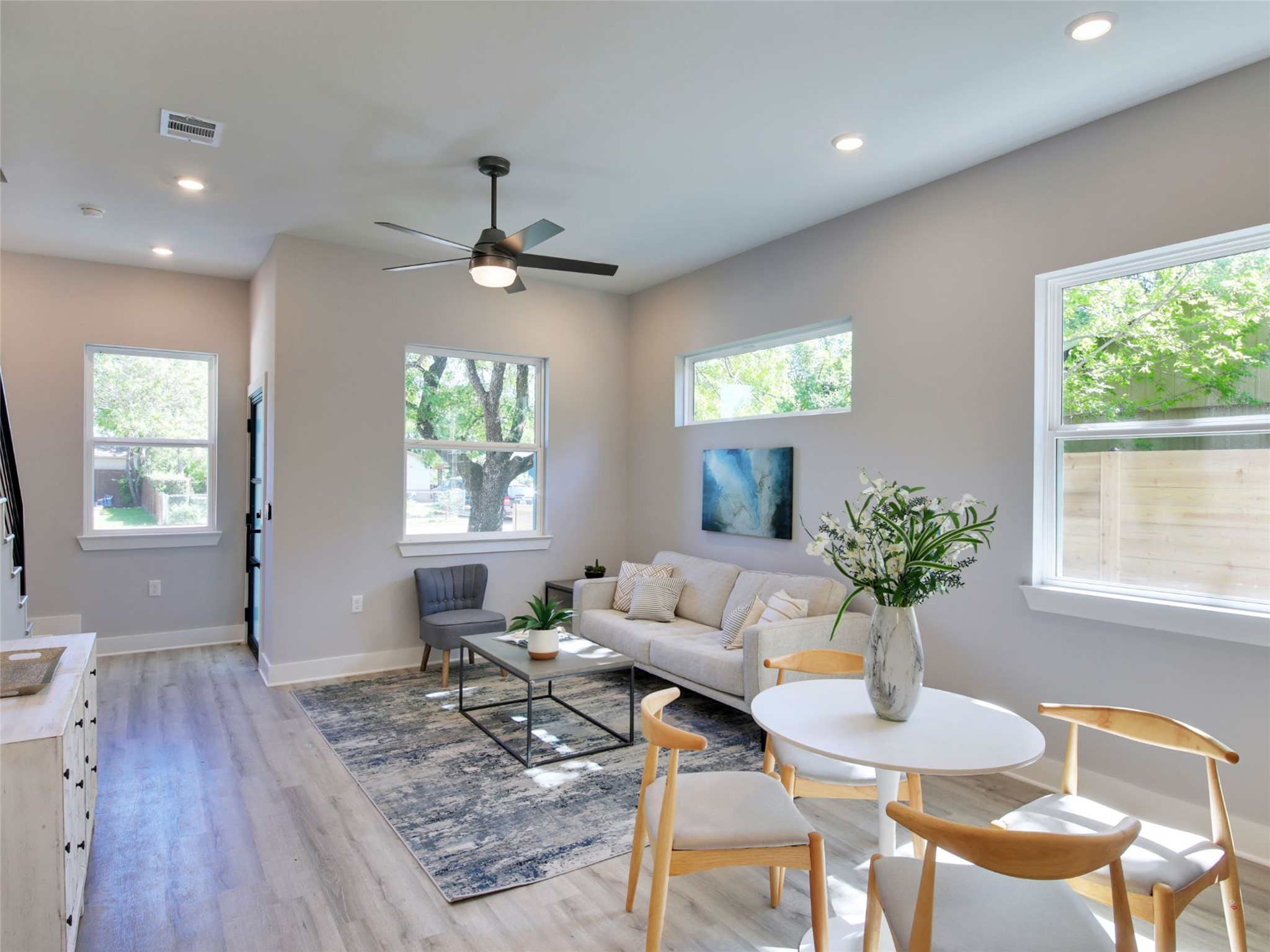 6111 Carnation Terrace, Unit 1 Austin, TX 78741 - Photo 6 of 23 a living room with furniture and a potted plant