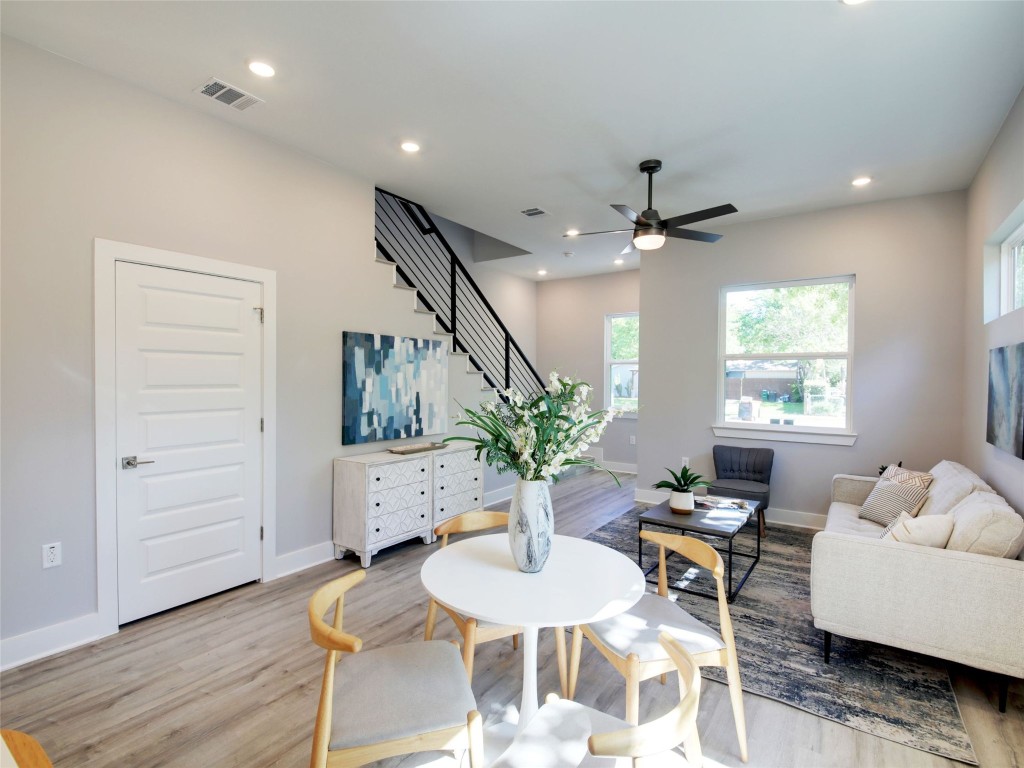 6111 Carnation Terrace, Unit 1 Austin, TX 78741 - Photo 7 of 23 a living room with furniture potted plant and a window