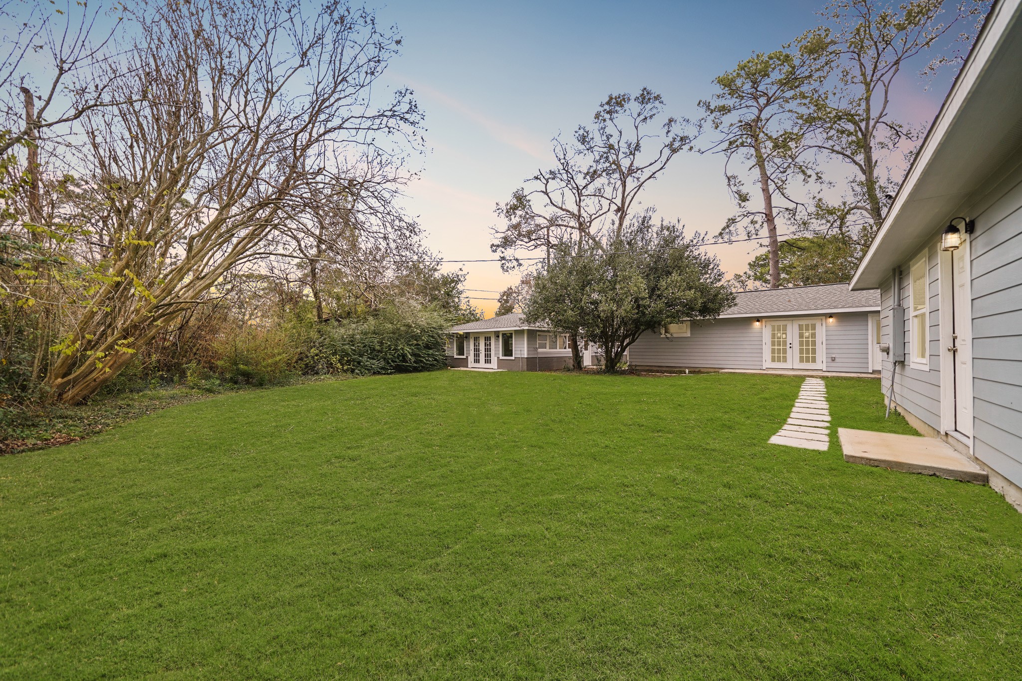 9313 Livernois Road Houston, TX 77080 - Photo 26 of 39 This HUGE backyard is definitely not lacking on green space!