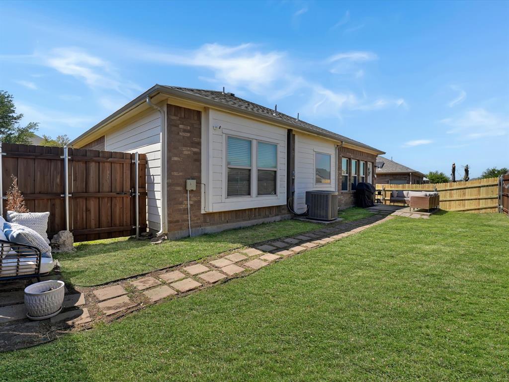 6527 Portside Ridge Lane Dallas, TX 75249 - Photo 29 of 30 a view of a house with backyard and porch