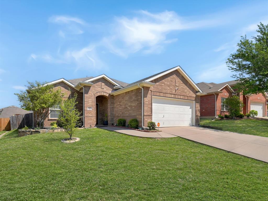 6527 Portside Ridge Lane Dallas, TX 75249 - Photo 4 of 30 a view of a house with a yard and a yard