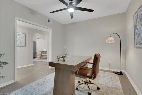 a workspace with furniture and bathroom