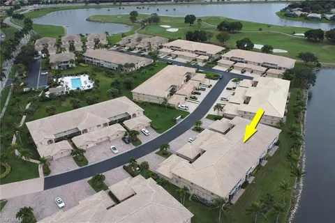 an aerial view of a house with outdoor space