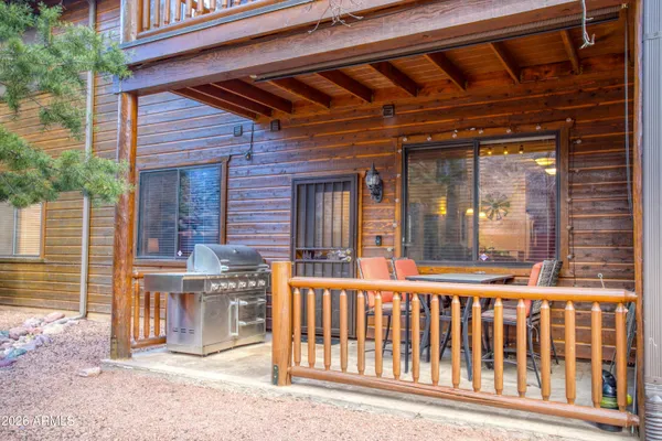 a view of balcony with furniture
