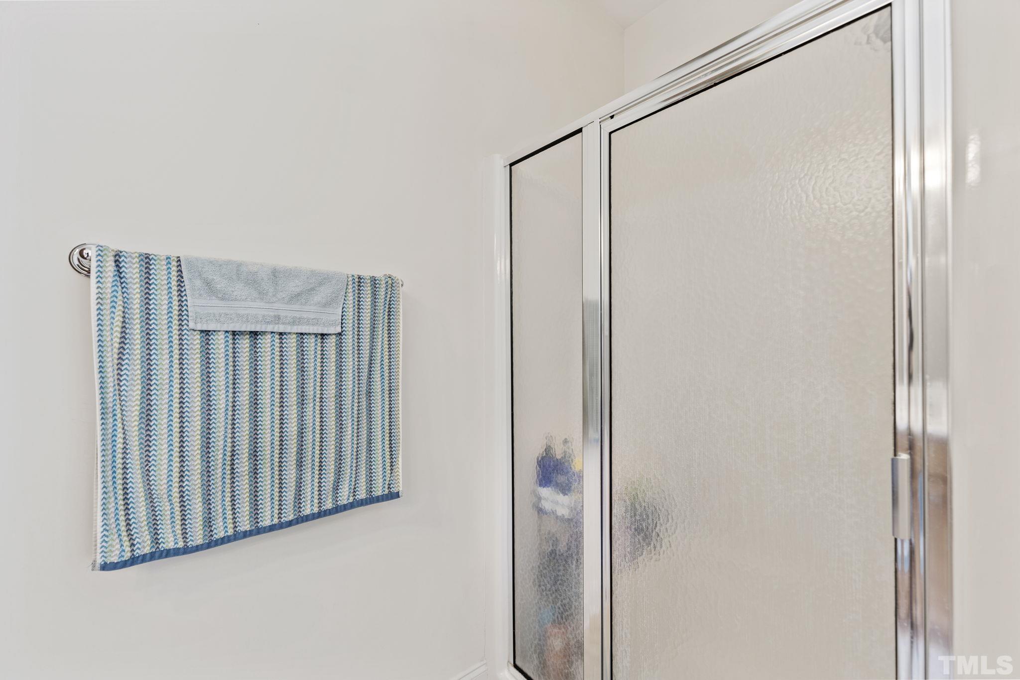 25 Eaglefeather Path Youngsville, NC 27596 - Photo 20 of 36 a view of a glass door and a window